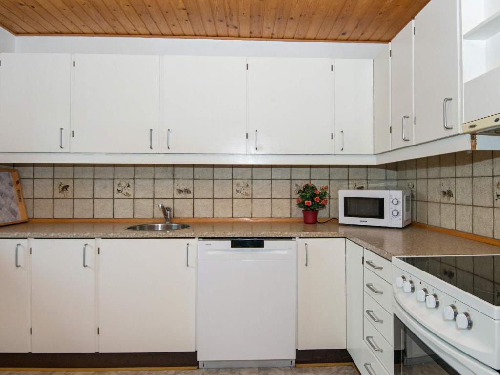 4 person holiday home in R m photo 1