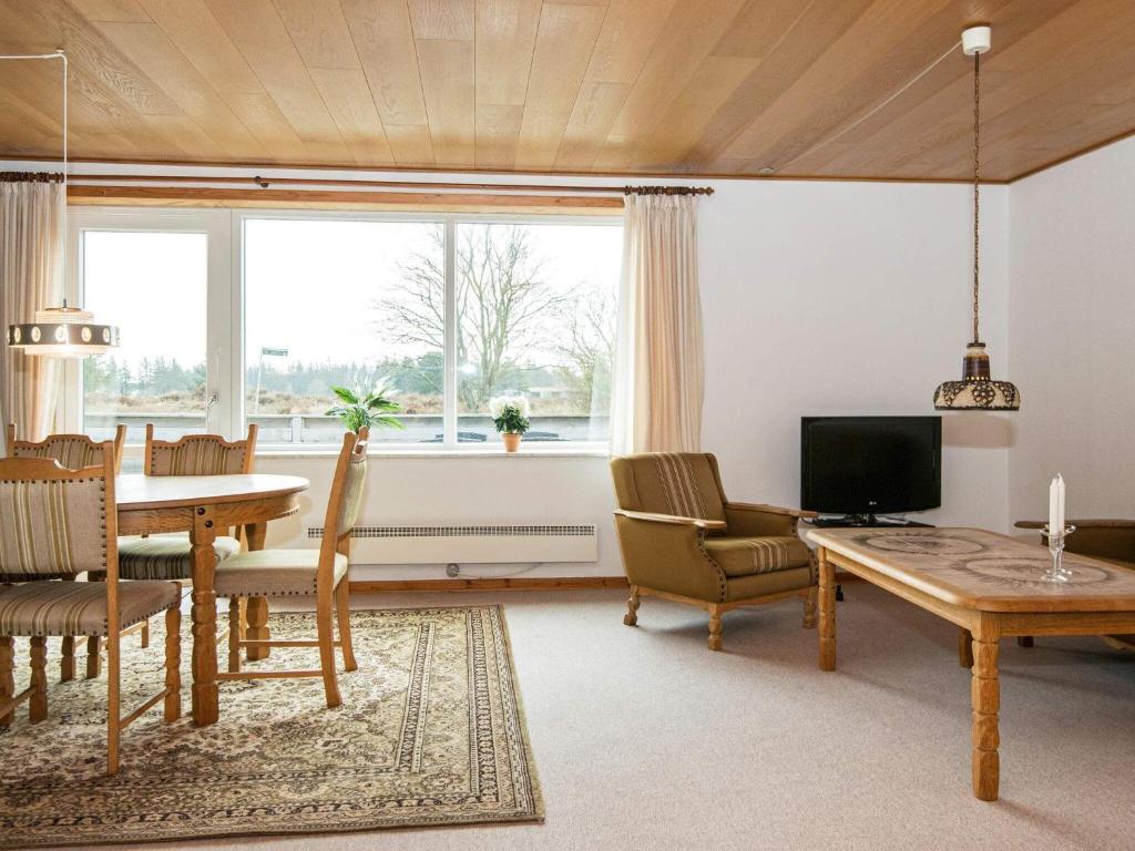 4 person holiday home in R m photo 4