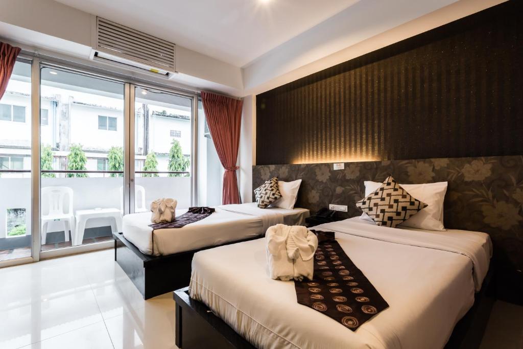 Двухместный (Staycation Offer Deluxe Twin Room + 10% Disc F&B), Курортный отель 7Q Resident