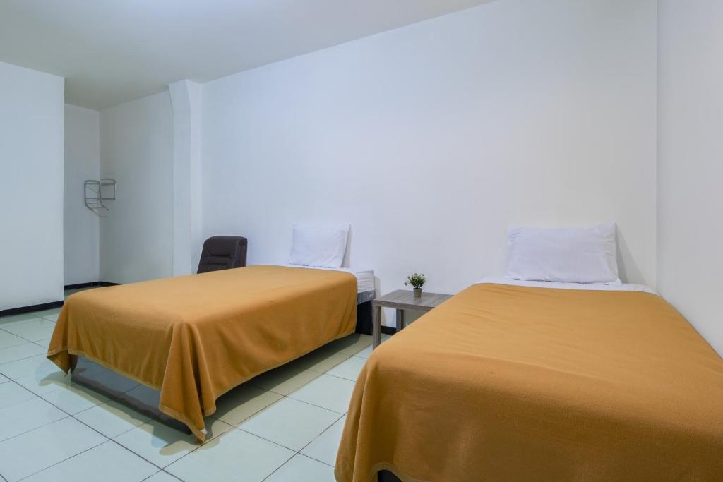 Двухместный (Двухместный номер Делюкс с 2 отдельными кроватями), ZEN Rooms Oriental Residence