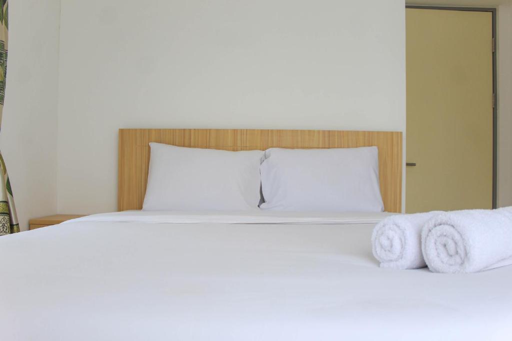 Golf View 1BR Apartment at M-Town Residence By Travelio