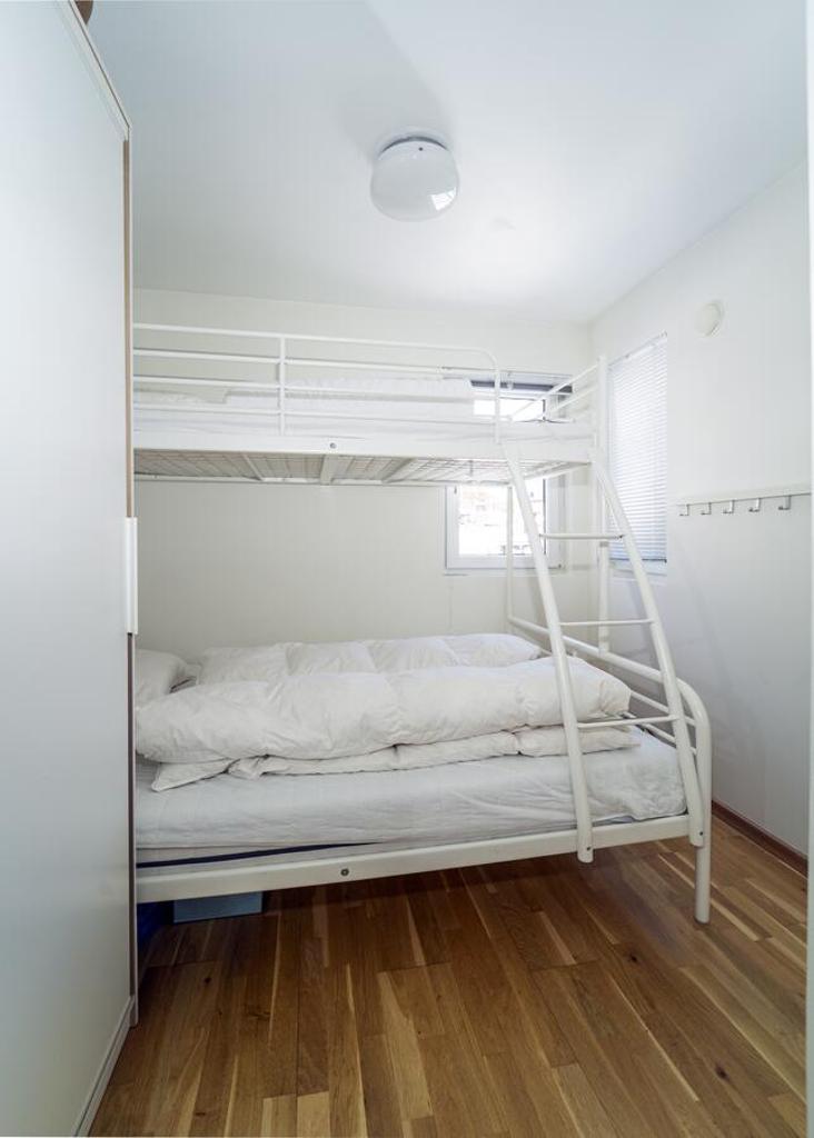 Three-Bedroom Apartment photo 1