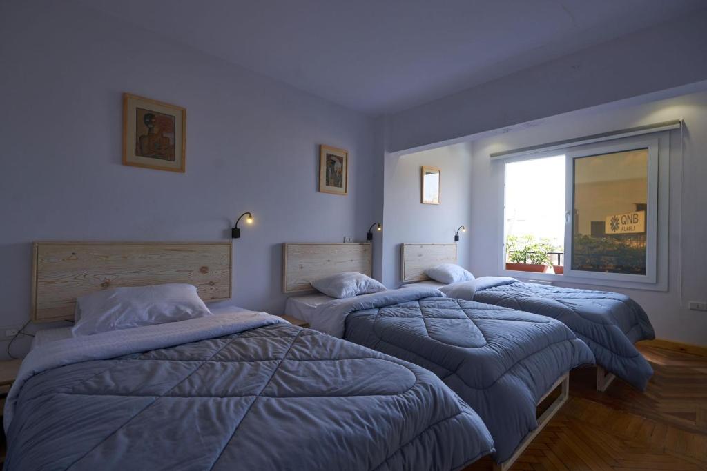 Трехместный (Трехместный номер с общей ванной комнатой), Madina Hostel