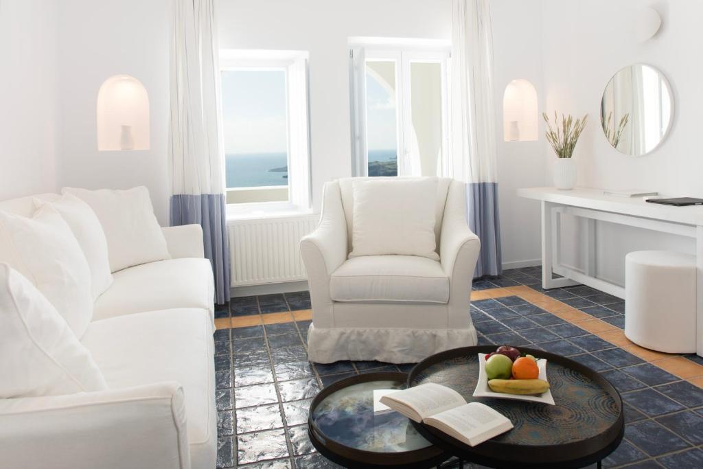 Caldera's Lilium Villas - Tap to explore photos