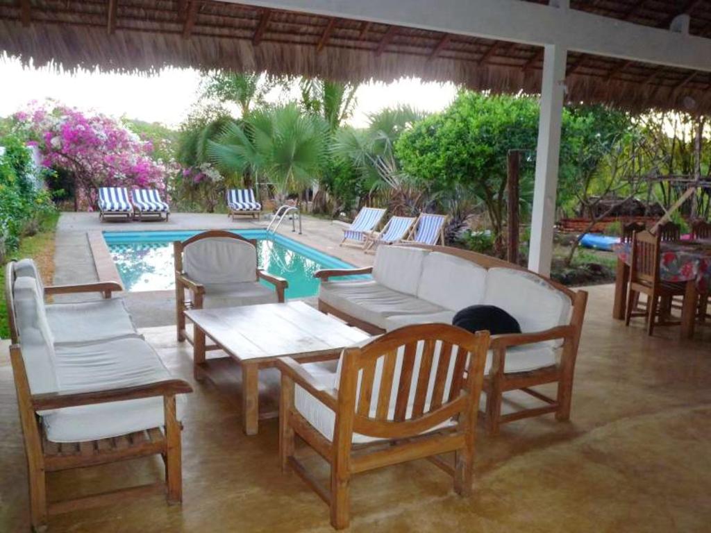 2 bedrooms bungalow with sea view shared pool and enclosed garden at Andilana