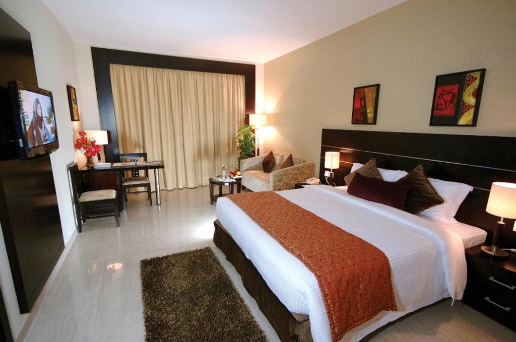 Двухместный (Улучшенный двухместный номер с 1 кроватью), Отель Landmark Riqqa Hotel