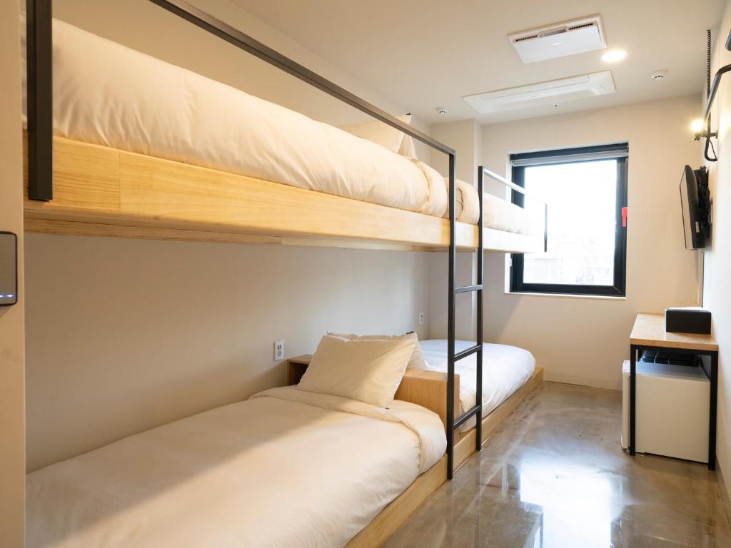 Четырехместный (Четырехместный номер с собственной ванной комнатой), Wegoinn Hostel