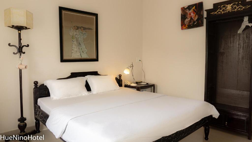 Двухместный (Улучшенный номер с кроватью размера «king-size»), Hue Nino Hotel