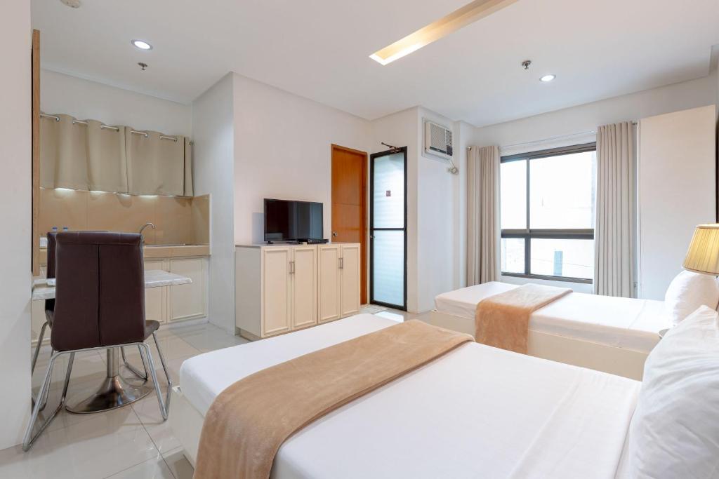 Двухместный (Двухместный номер Делюкс с 2 отдельными кроватями), Baymont Suites & Residences