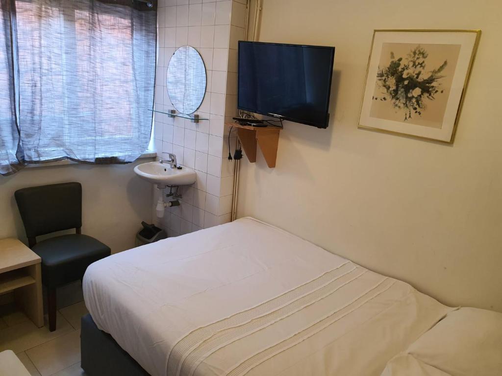 Одноместный (Одноместный номер с общей ванной комнатой), Hotel Schroder