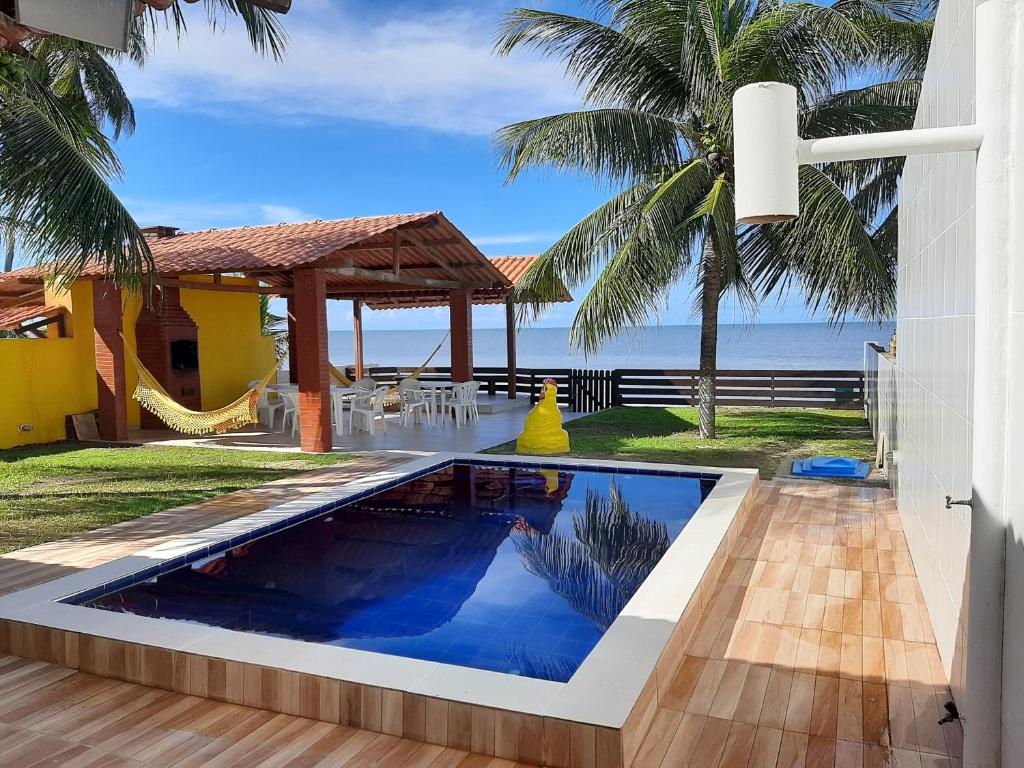 Casa à beira-mar, piscina photo 4