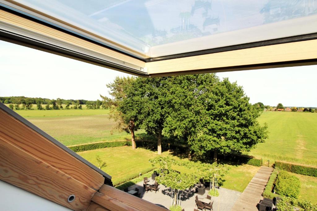 Двухместный (Улучшенный двухместный номер с 1 кроватью или 2 отдельными кроватями и видом на сад), Art & Wellness Hotel Huis ten Wolde