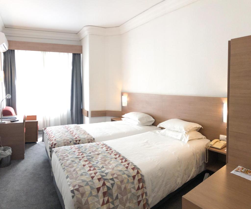 Двухместный (Двухместный номер с 2 отдельными кроватями), Hotel Flamingo
