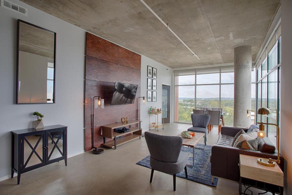 Gaze at Sprawling Green Vistas Through Walls of Windows image
