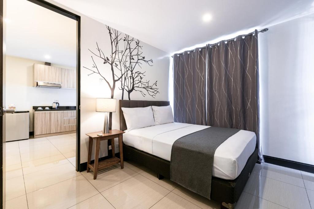 Двухместный (Номер Делюкс с 1 спальней), Artemis Place Makati Hotel