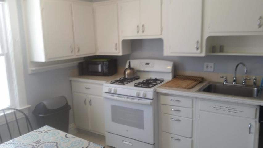 E Michigan Walk Up Furnished 1 Bedroom APT photo 2