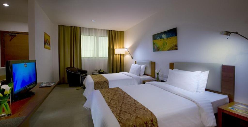 Gloria Swiss Hotel & Apartment Sandakan - Tap to explore photos