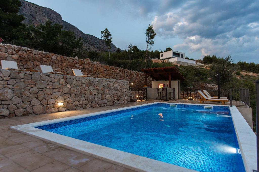 Exclusive Villa Almissa with swimming pool and sea view photo 1