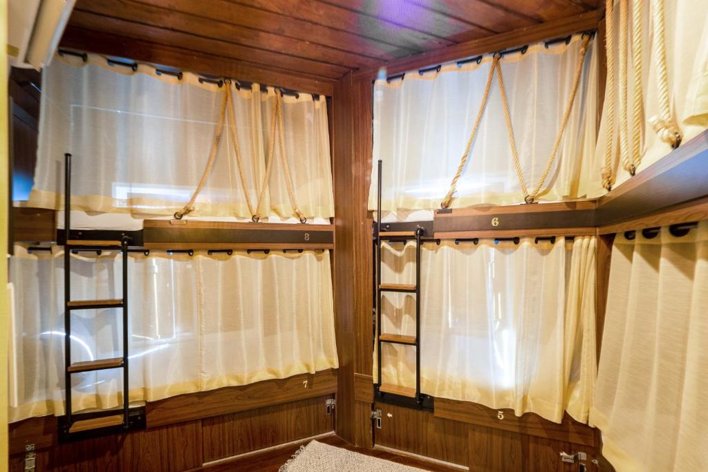 Номер (Односпальная кровать в общем номере для женщин), The Onion Hostel
