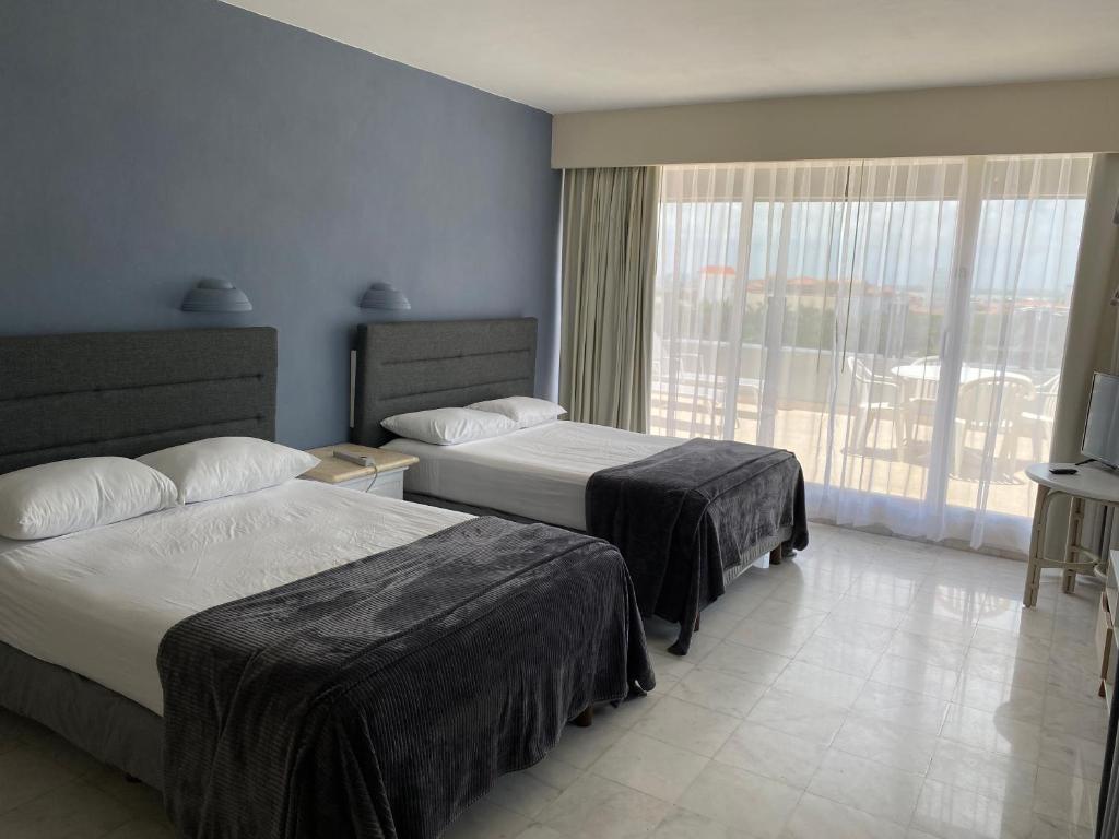 Апартаменты (Апартаменты с террасой), Ocean Front Condo in Hotel Zone