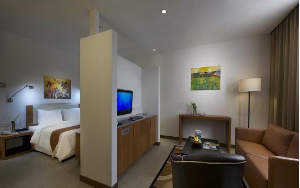 Gloria Swiss Hotel & Apartment Sandakan - Tap to explore photos