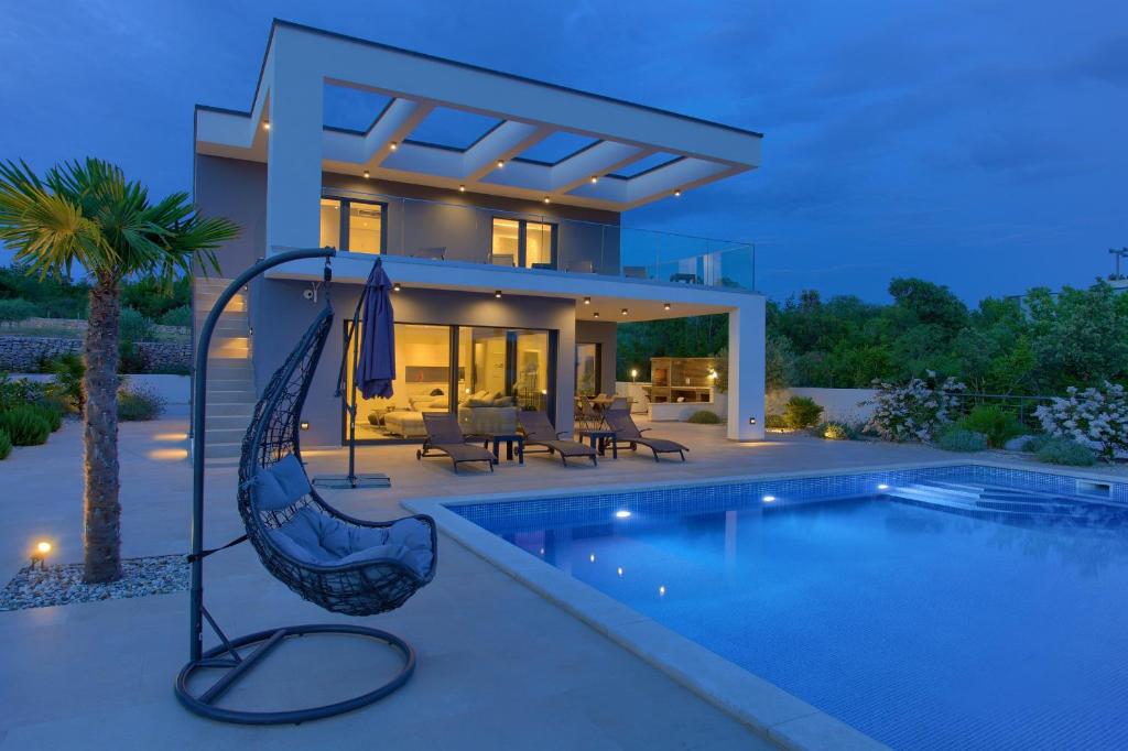 Villa QUADRA with heated pool photo 4