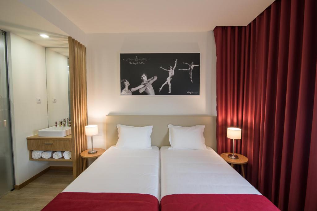 Двухместный (Двухместный номер Делюкс с 2 отдельными кроватями), Porto Coliseum Hotel