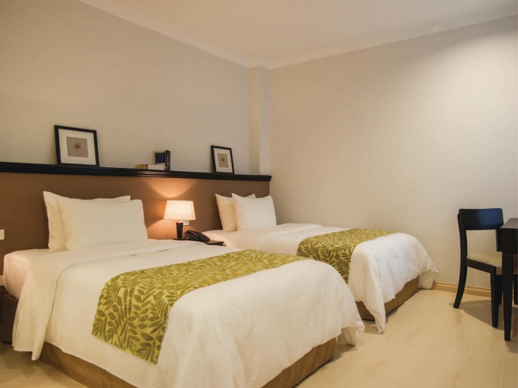 Двухместный (Двухместный номер с 2 отдельными кроватями), The Alcove Library Hotel