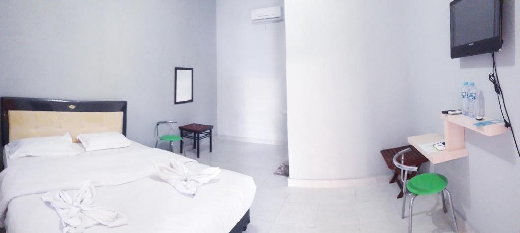 Pondok Wisata dan Restoran Elim Room Type - Deluxe Double Room