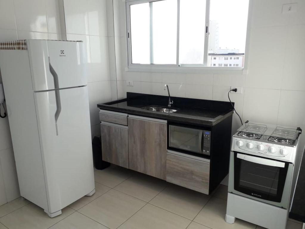 EXCELENTE APARTAMENTO NOVO - PRÓXIMo A PRAIA !!