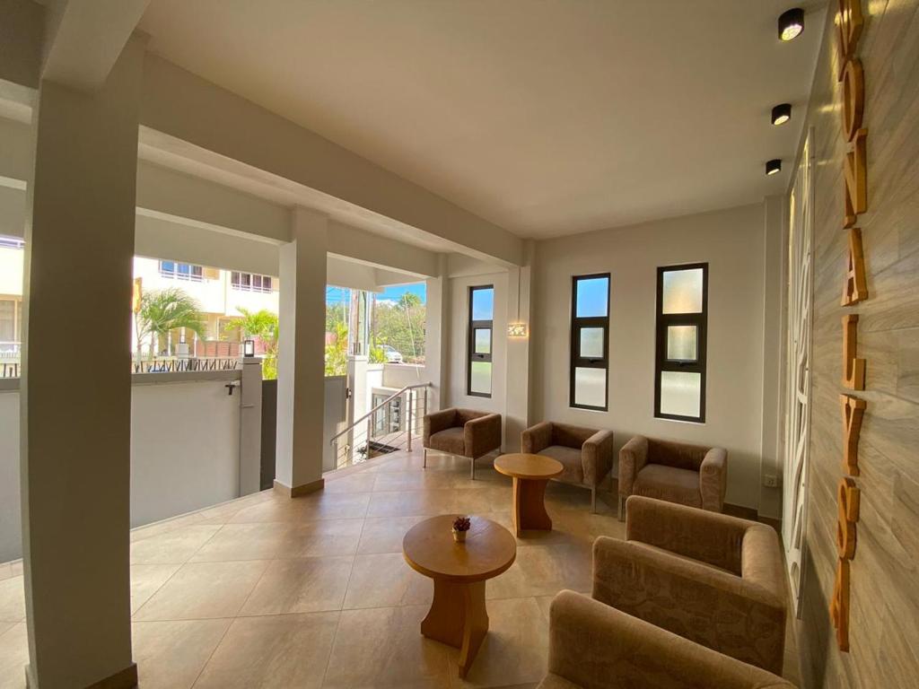 The Monalysa Suites & Residence - Tap to explore photos