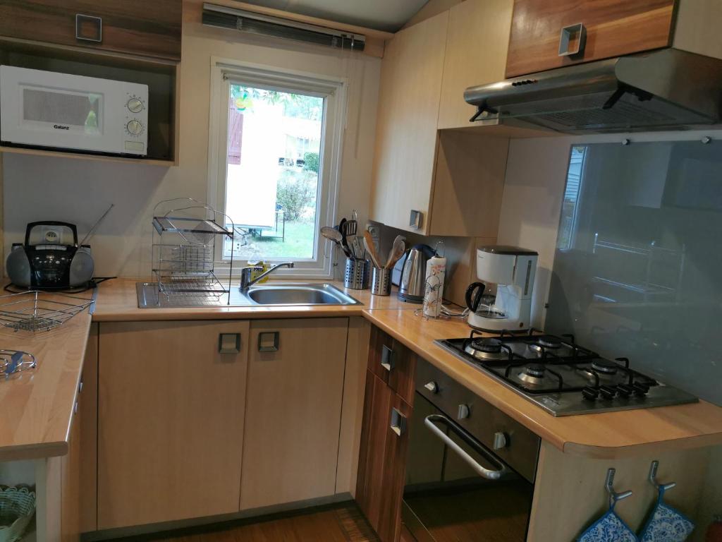 Assist' Mobil Home 276 - Mobil home 3 chambres au calme photo 2