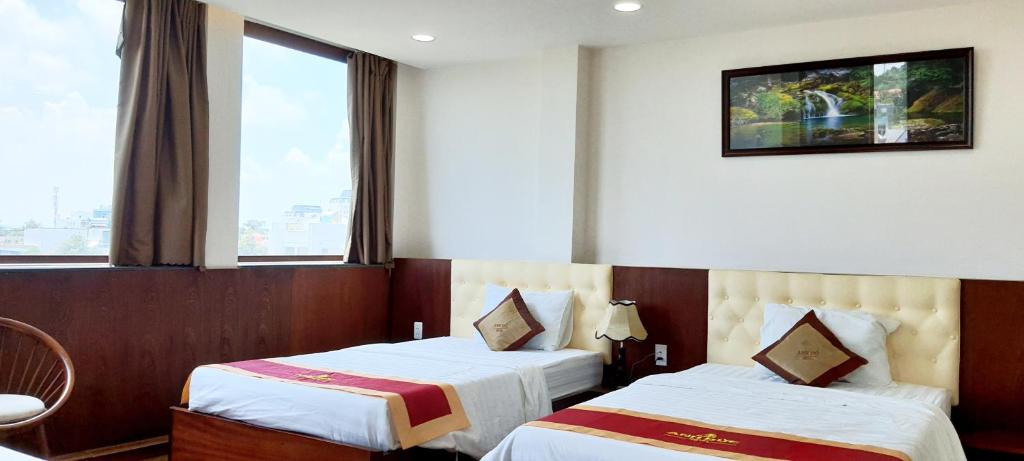 Четырехместный (Номер Делюкс с 2 кроватями размера «queen-size»), 7s Anh Duc 1 Hotel Binh Duong