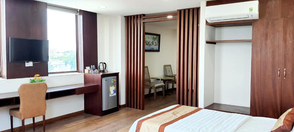 Четырехместный (Номер Делюкс с 2 кроватями размера «queen-size»), 7s Anh Duc 1 Hotel Binh Duong