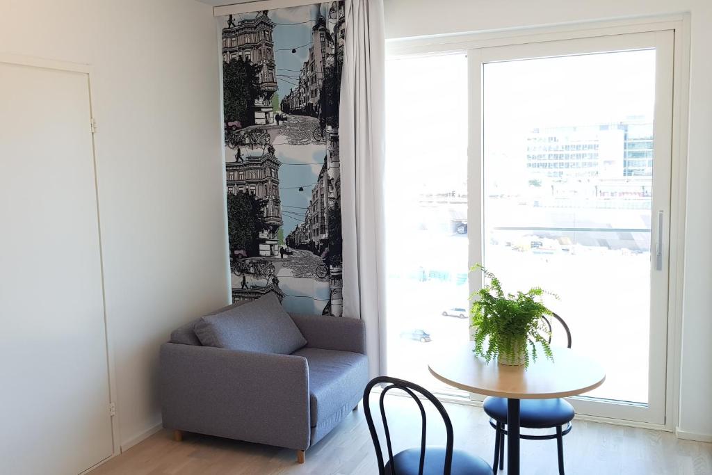 Top floor studio at Central Pasila - Tap to explore photos