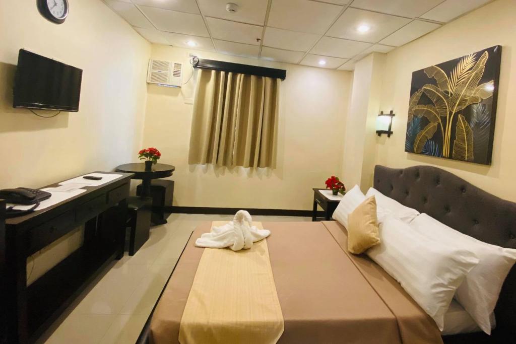Студио (Двухместный номер-студио Делюкс с 1 кроватью), Amax Inn Makati