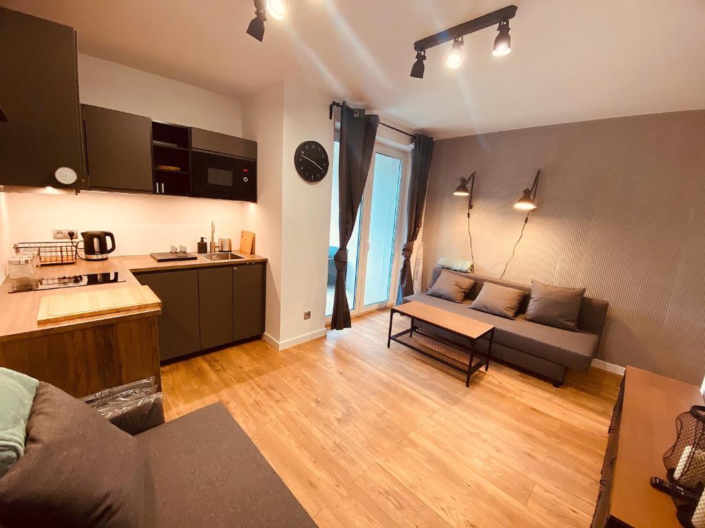 REWAL Komfortowy apartament przy plaży typu STUDIO photo 1