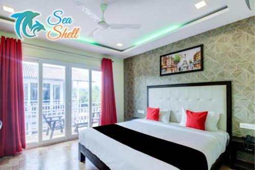Двухместный (Двухместный номер с 1 кроватью и балконом), Sea Shell Beach Cottages & Suites