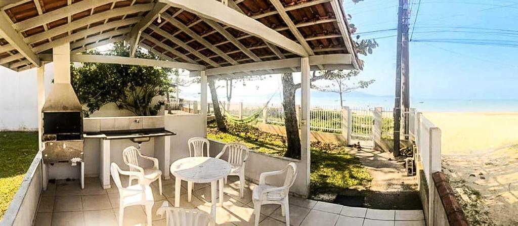Bruno Klemtz Casa frente Mar Pé na areia Lindo pátio com gramado privativo Ar Split WIFi - 6 x sem juros photo 2