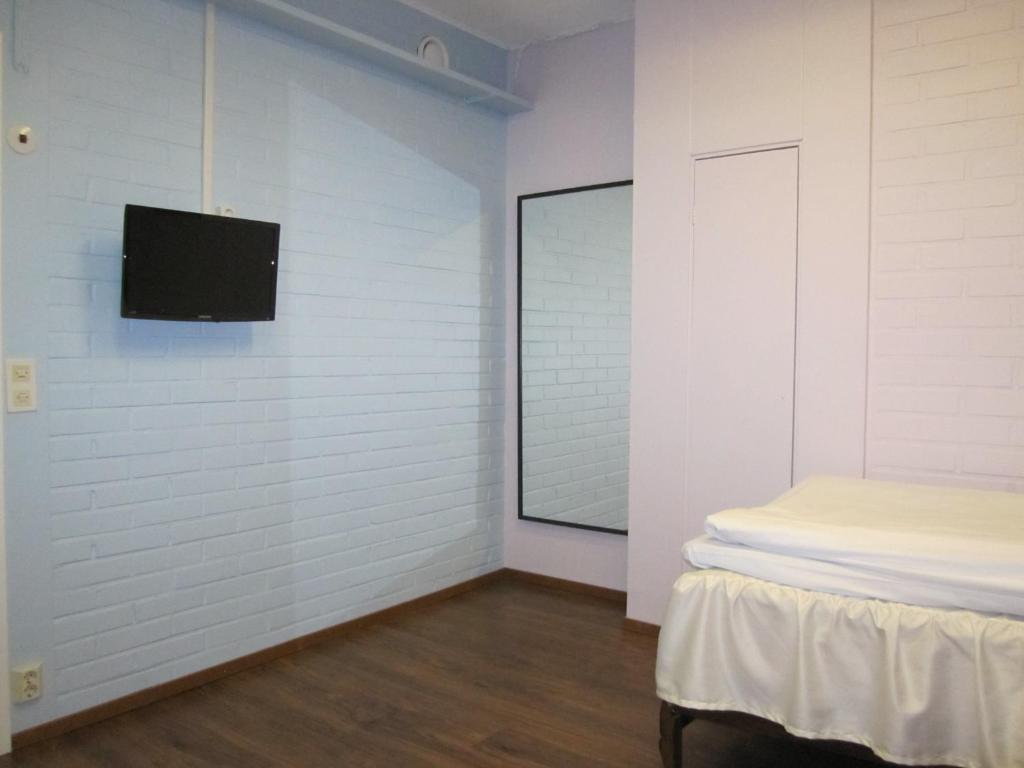 Одноместный (Стандартный одноместный номер с общей ванной комнатой), Finn Rooms