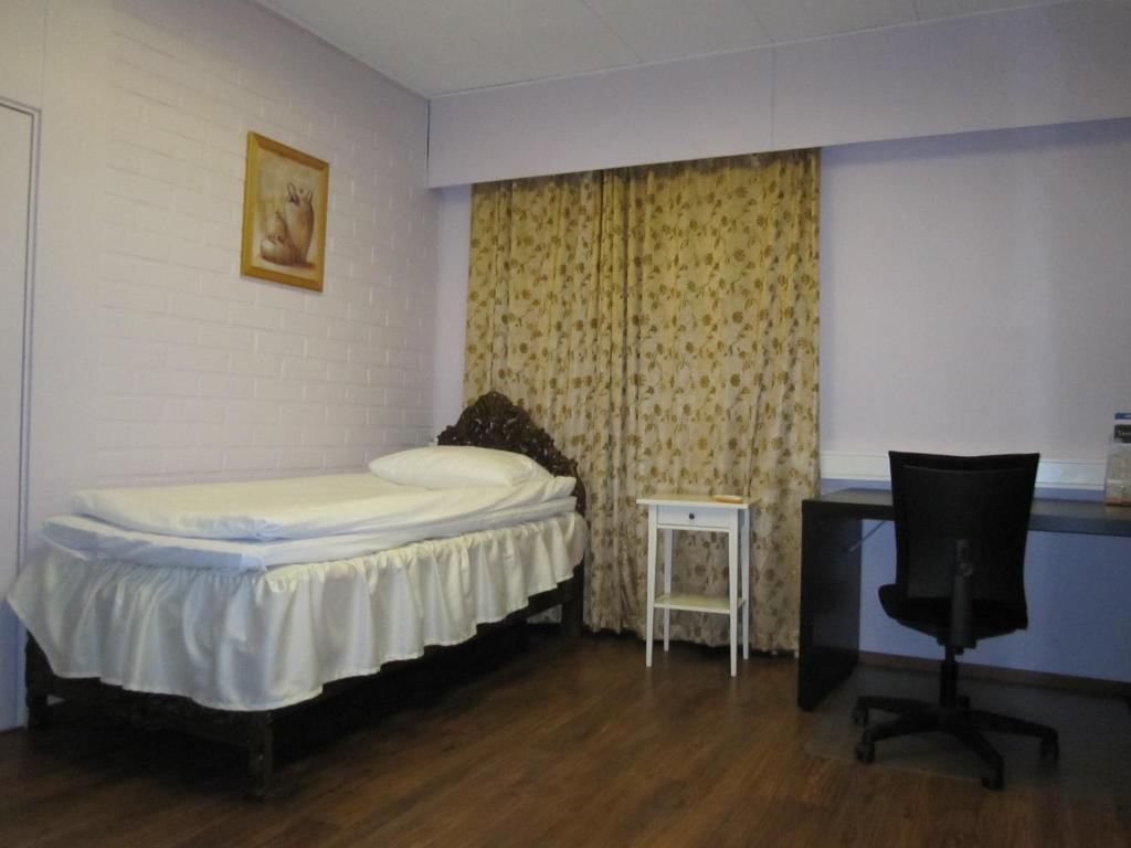 Одноместный (Стандартный одноместный номер с общей ванной комнатой), Finn Rooms