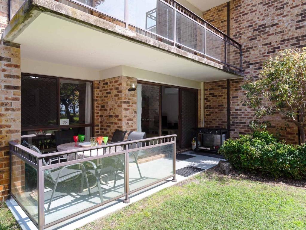 Bay Parklands 57 ground floor unit with pool tennis court and aircon photo 1