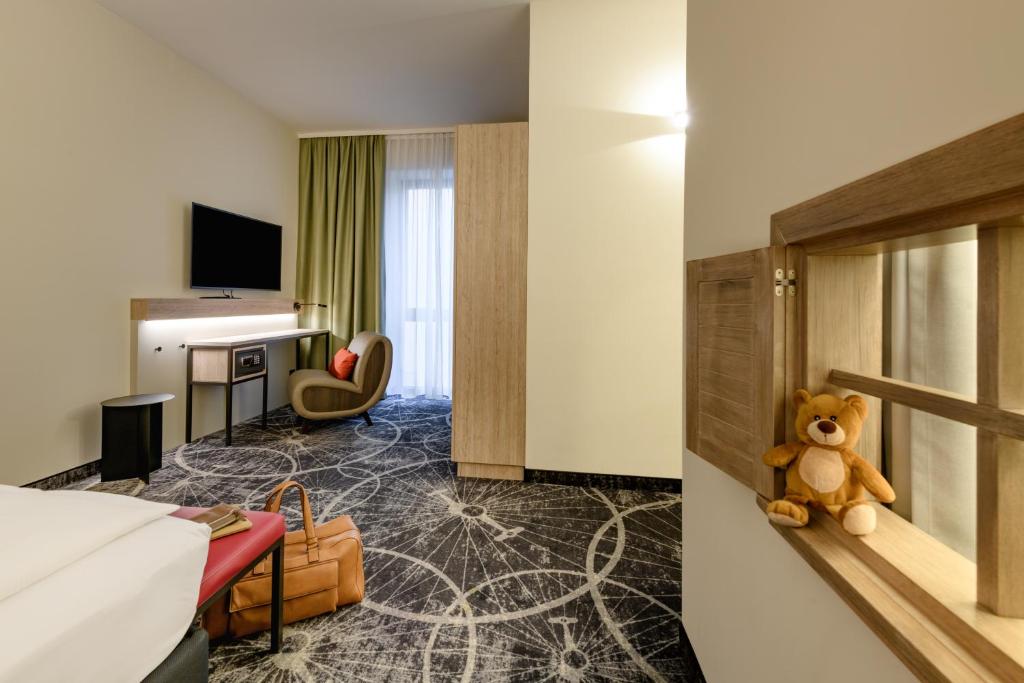 ibis Styles Magdeburg - Tap to explore photos