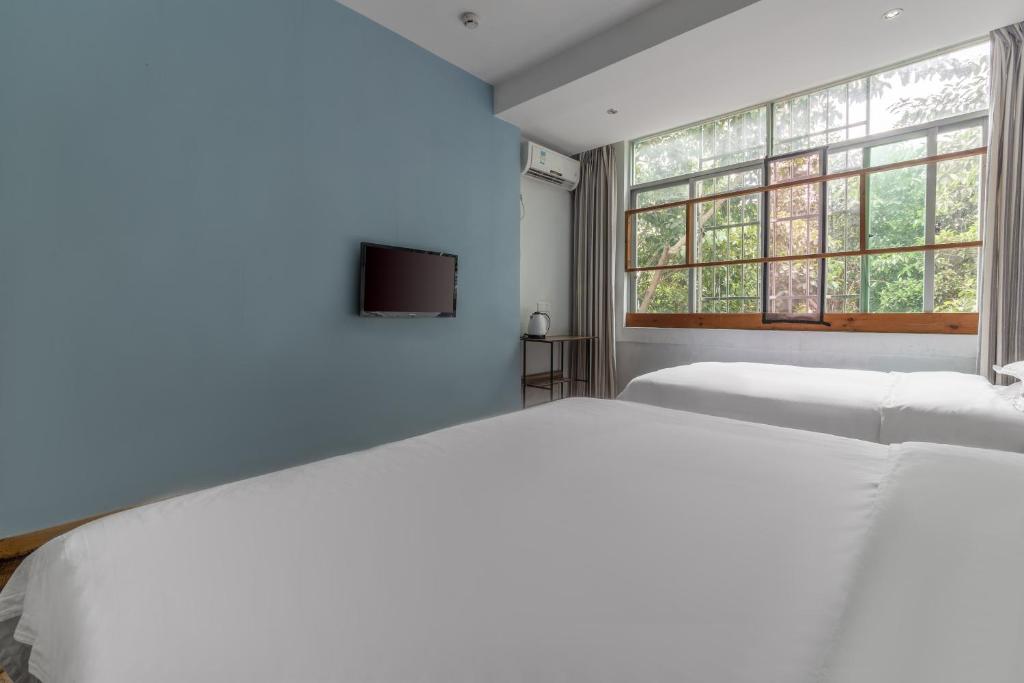 Семейный (Cемейный номер с собственной ванной комнатой), Sanya BlueSky International Youth Hostel