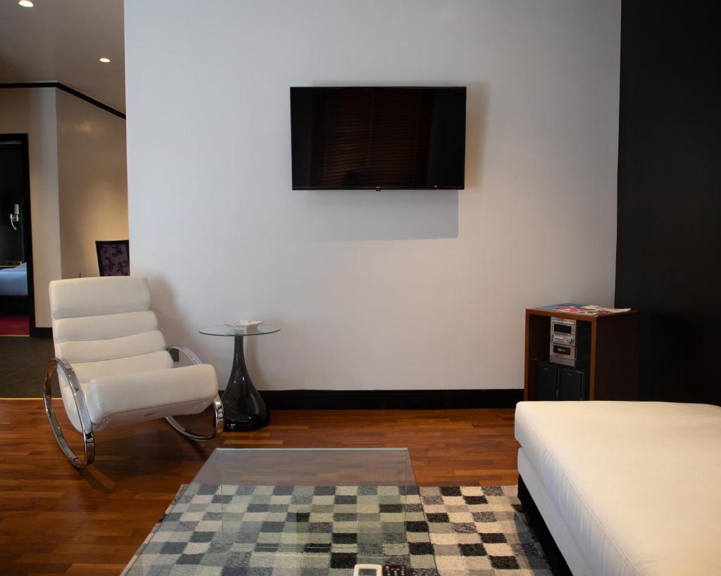 Andromeda Suites and Apartments - Tap to explore photos