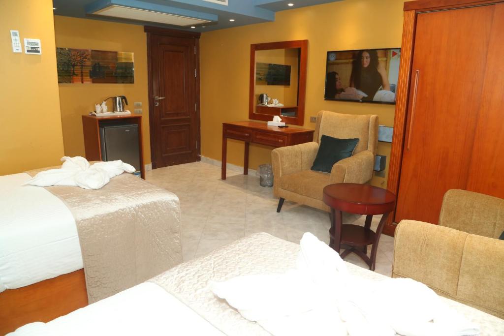 Сьюит (Люкс, вид на сад), Grand Nile Royal Hotel at Nile Plaza