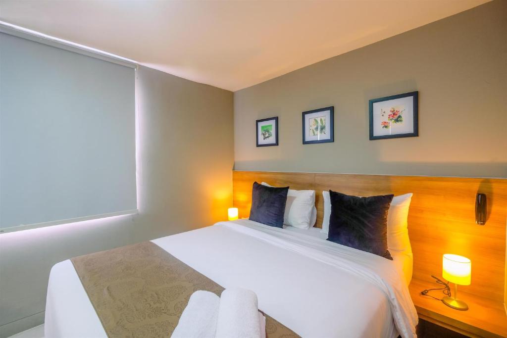 Fully Furnished with Comfortable 1BR Apartment at Mustika Golf Residence By Travelio photo 1