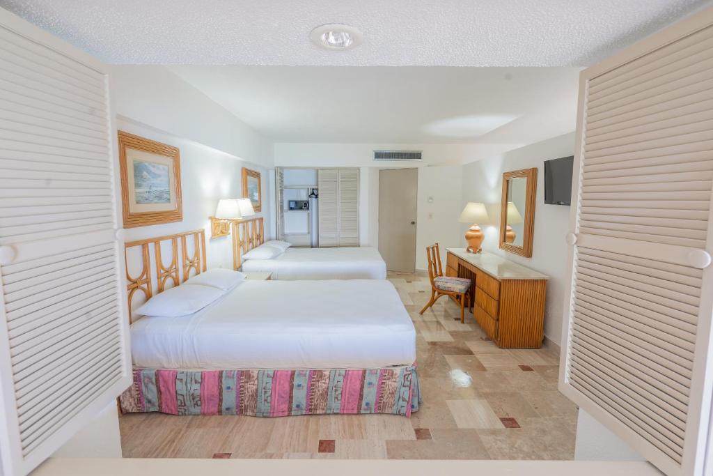 Четырехместный (Полулюкс (для 4 взрослых)), Playa Suites Acapulco