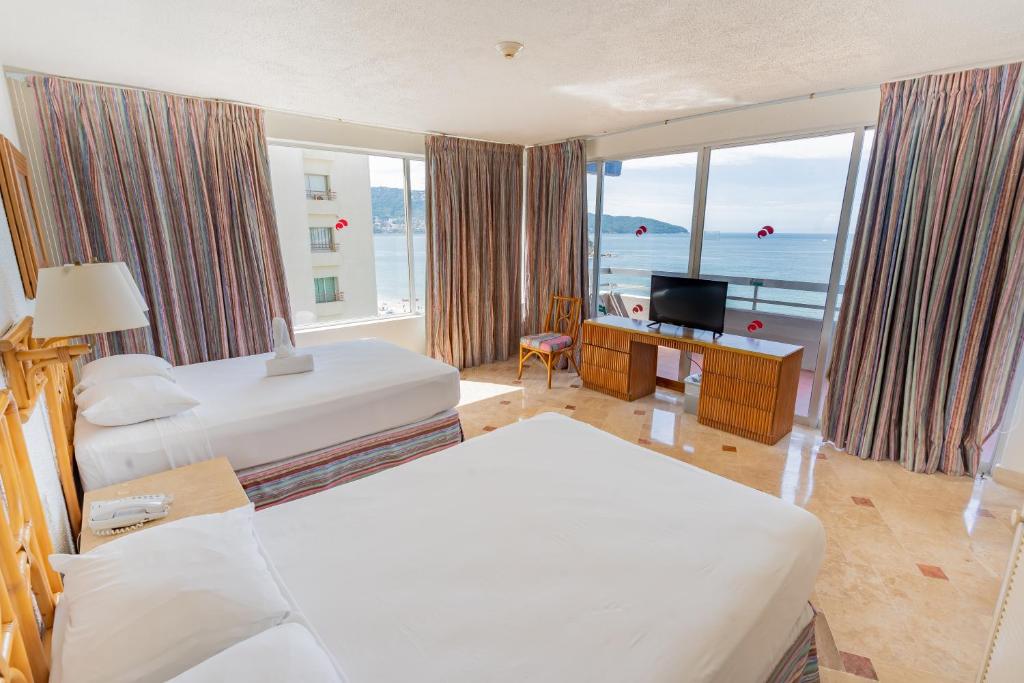 Сьюит (Люкс с видом на море (для 3 взрослых)), Playa Suites Acapulco
