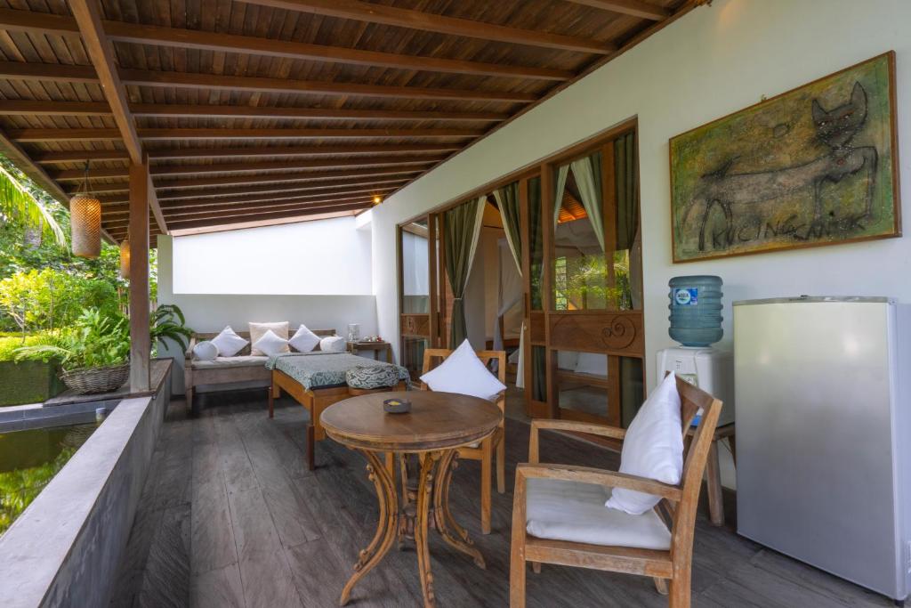 Сьюит (One-Bedroom Family Suite with Jacuzzi and  Free Benefit), De Ubud Villas & Spa